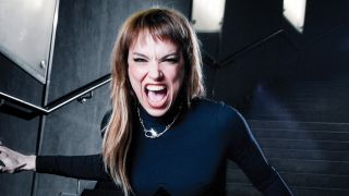 Lzzy Hale screaming at the camera