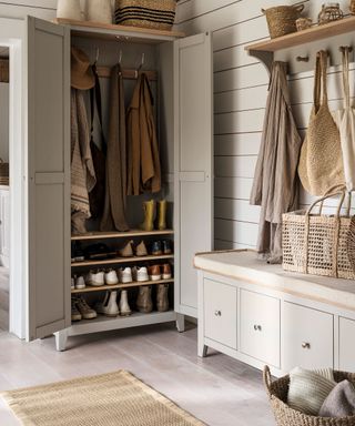 grey hallway cupboard and seating with storage