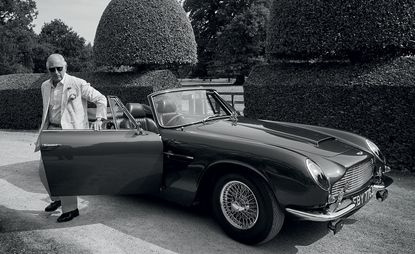 Prince Charles with his Aston Martin DB6 MKII Volante