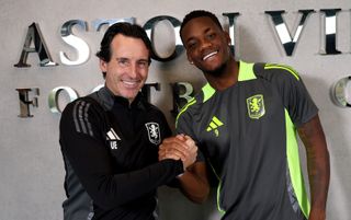 Jhon Duran of Aston Villa signs a new contract pictured with Unai Emery manager of Aston Villa at Bodymoor Heath training ground on October 07, 2024 in Birmingham, England.