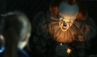 It Chapter Two Pennywise holds the flame in the bleachers