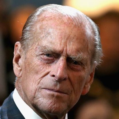 Prince Philip wearing a suit and tie
