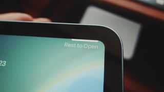iPad (2022) close up on Touch ID UI that says "Rest to Open"