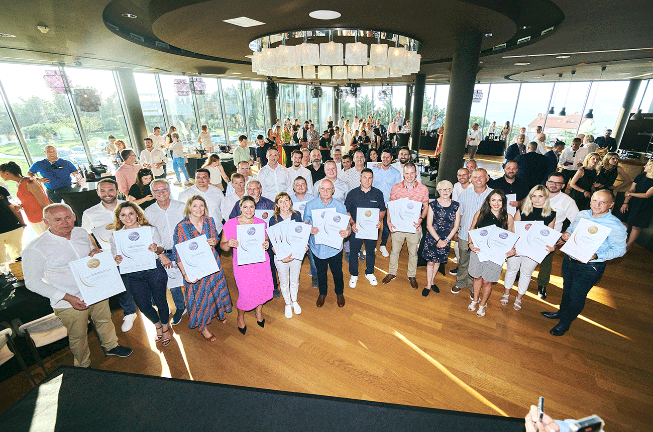 Winemakers celebrating their medal wins
