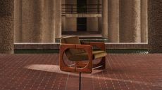 a mid century arm chair photographed in the barbican
