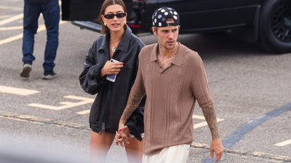 Hailey Bieber (L) and Justin Bieber are seen at the Westside Heliport on August 29, 2023 in New York City.