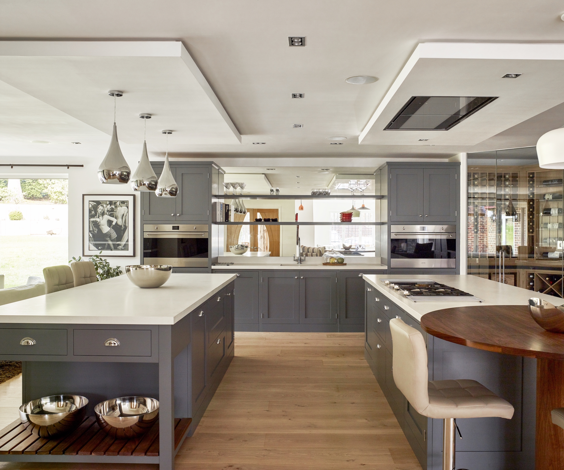 grey kitchen with two islands