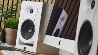 A pair of Kali Audio LP-6 V2 studio monitors on a studio desk