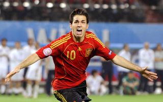 Cesc Fabregas celebrates after scoring the winning penalty for Spain against Italy in the quarter-finals of Euro 2008.