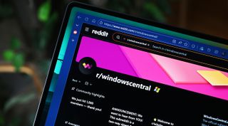Photo of the r/windowscentral subreddit on a laptop display