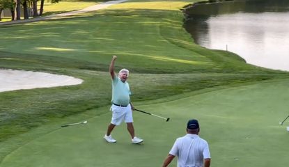 Henley fist pumps to the sky after holing his winning putt