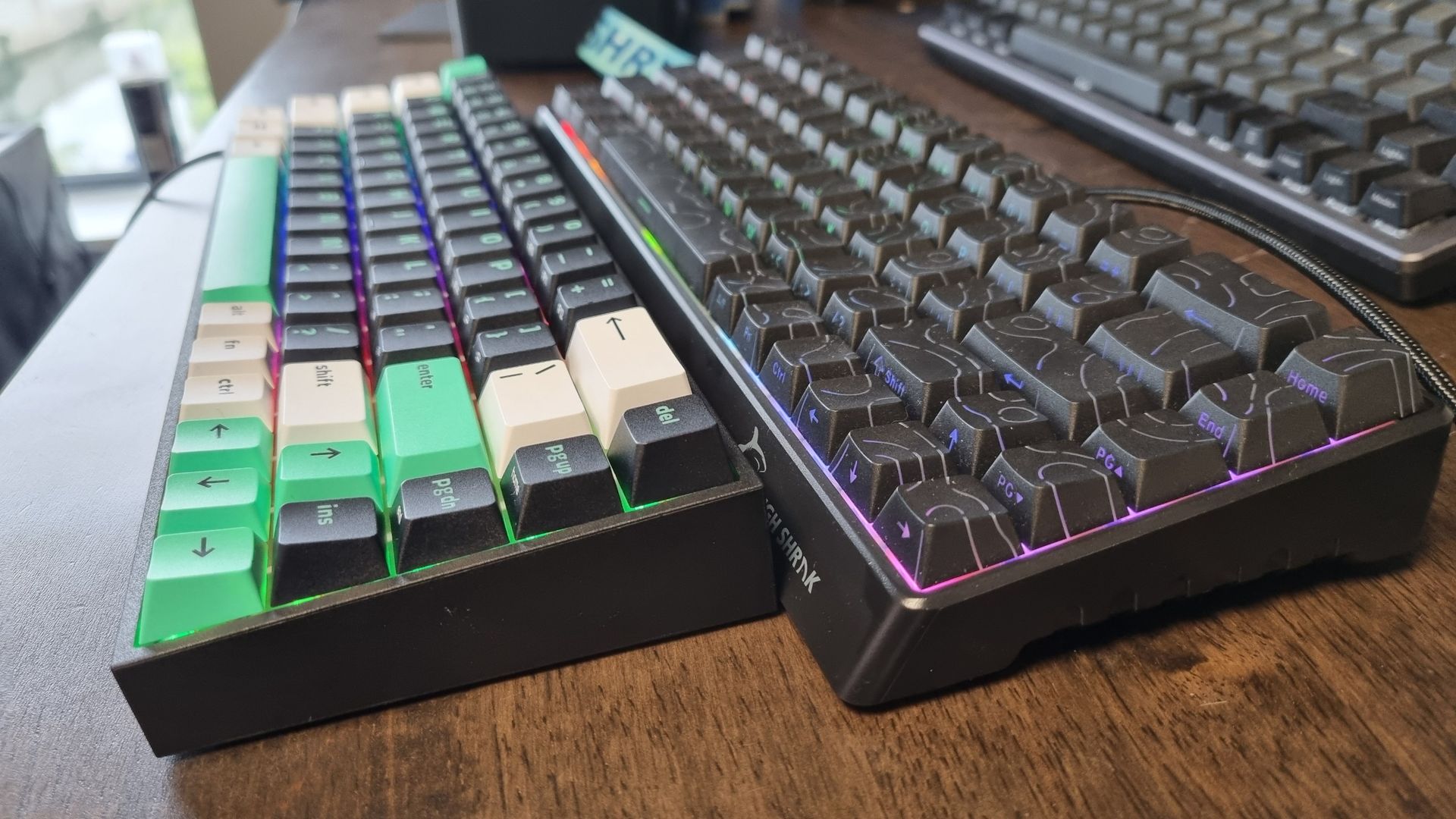 The Gamakay x NaughShark NS68 and the Razer Reclusa X Mini 65% next to each other on a desk