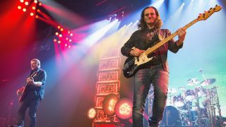 Alex Lifeson, Geddy Lee and Neil Peart of Rush performs on stage during the R40 LIVE Tour at KeyArena on July 19, 2015 in Seattle, Washington. 