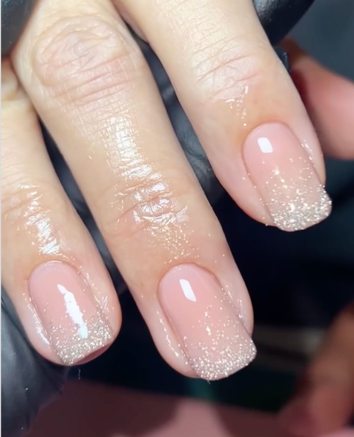 Glitter ombré nails.