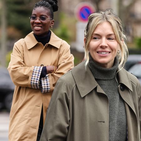Nikki Ogunnaike and Sienna Miller wearing Sezane trench coats