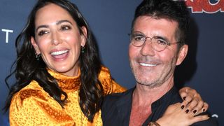Lauren Silverman and Simon Cowell arrives at the "America's Got Talent" Season 14 Live Show Red Carpet at Dolby Theatre on September 17, 2019 in Hollywood, California.