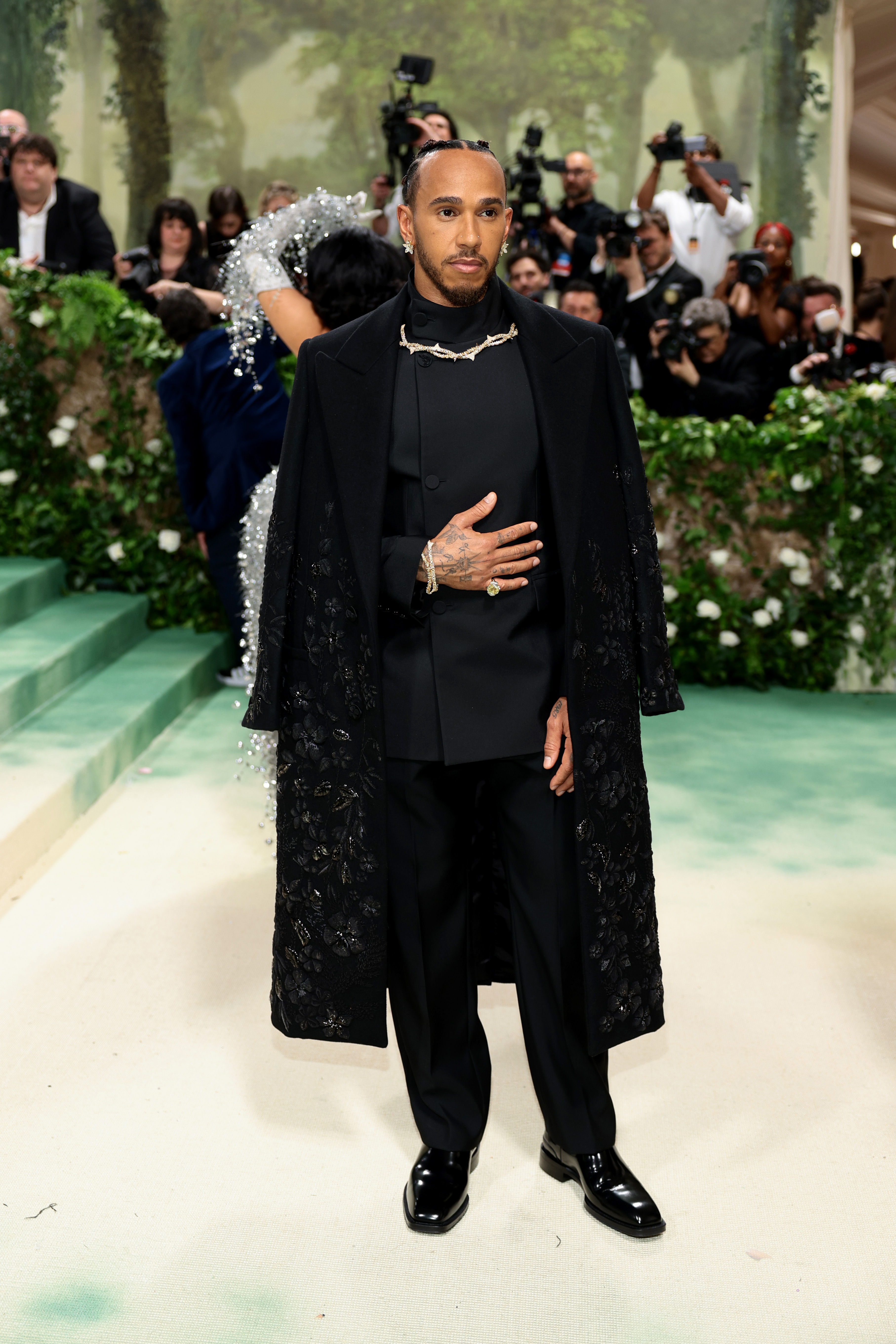 Lewis Hamilton wearing a black beaded Burberry suit at the Met Gala.