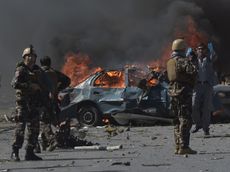 Afghan security forces personnel are seen at the site of a car bomb attack in Kabul on May 31, 2017.At least 40 people were killed or wounded on May 31 as a massive blast ripped through Kabul