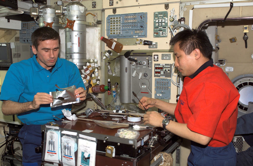 Astronauts Dining in the International Space Station