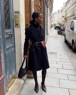 An image of influencer @sylviemus_ showcasing an updo for shoulder-length hair.