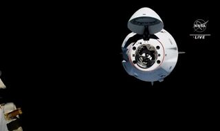 SpaceX's Crew-2 Crew Dragon Endeavour arrives at the International Space Station with four astronauts aboard in a smooth docking on April 24, 2021 one day after launching into orbit.