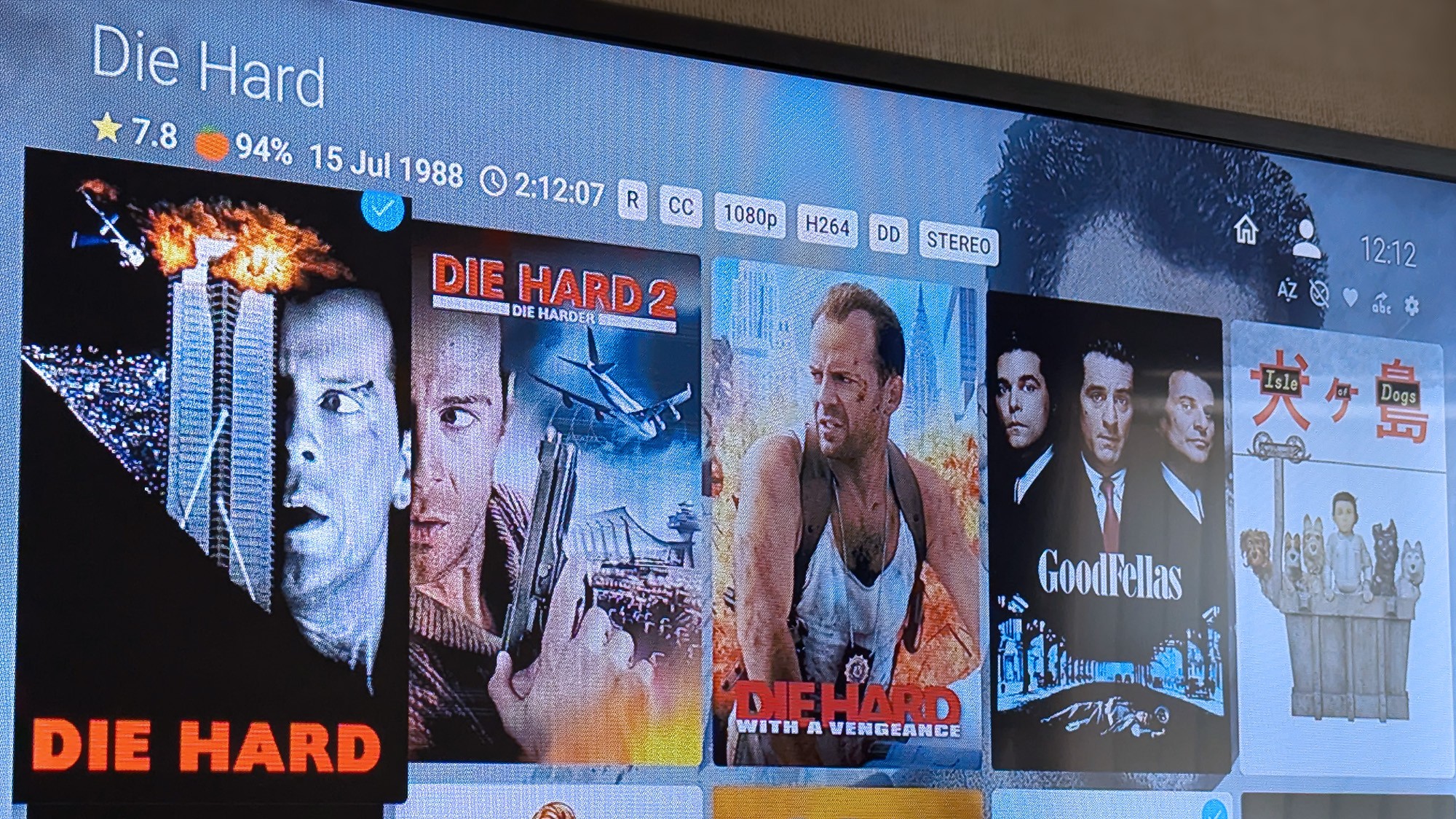 A photo of the Jellyfin app running on a TV showing Die Hard movies.