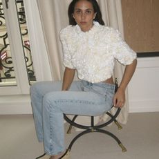 Hanna MW wearing vintage Levi's jeans with a sequin top and Chanel pumps in another. 