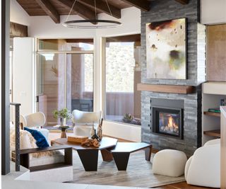 Living room with fireplace and chairs