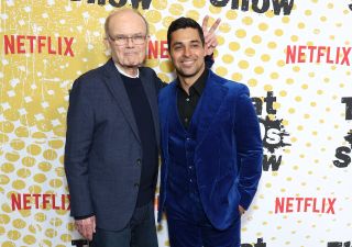 Kurtwood Smith giving WIlmer Valderrama bunny ears on That '90s Show red carpet
