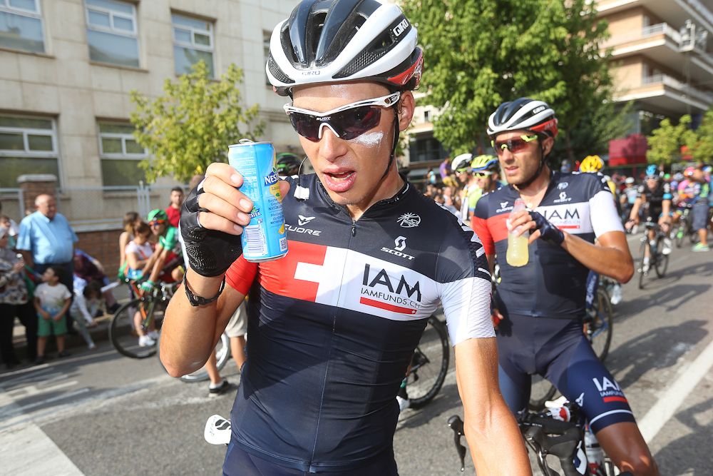 An IAM Cycling rider recovers from stage 12.