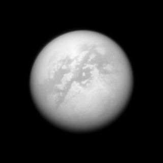 NASA's Cassini spacecraft peers through the murk of Titan's thick atmosphere in this view, taken with Cassini's narrow-angle camera on Sept. 25, 2008.