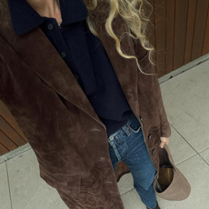 woman wearing suede pointed toe ankle boots trend 2025