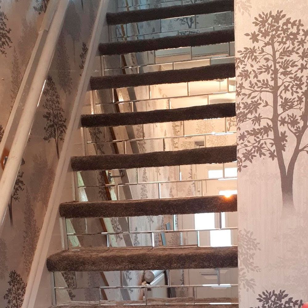 Bland to bling! Hallway gets a dramatic makeover with mirrored