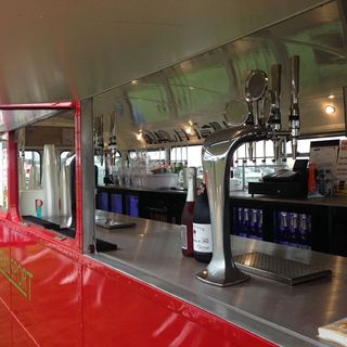 red bus with bar and drinks