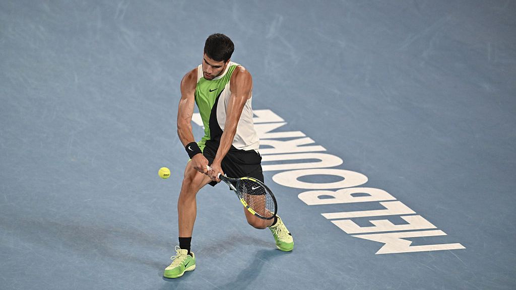 Carlos Alcaraz hits a backhand during a match at the Australian Open 2026