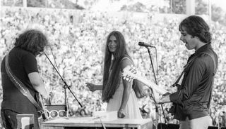 (from left) Jerry Garcia, Donna Godchaux, and Bob Weir perform with The Grateful Dead at Santa Barbara Stadium in California on June 4, 1978