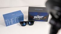 A pair of Viture Beast glasses in front of the boxes for Xreal 1S and Viture Beast