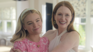 Milly Alcock and Julianne Moore smiling and hugging in Sirens