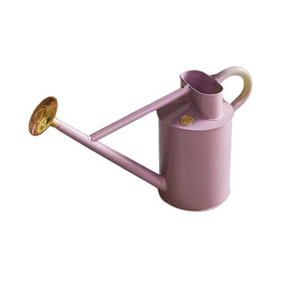 A pink watering can