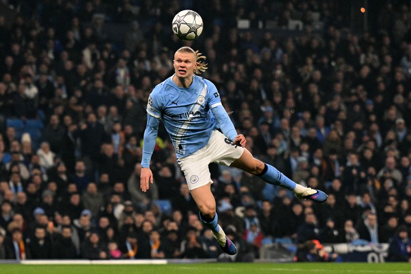 Manchester City's Norwegian striker #09 Erling Haaland dives to header the ball at goal in the opening seconds of the match, but the shot goes wide during the UEFA Champions League football match between Manchester City and Galatasaray at the Etihad Stadium in Manchester, north west England, on January 28, 2026. (Photo by Oli SCARFF / AFP)