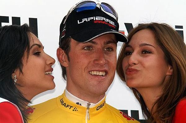 Hey, I get the girls! Bernhard Eisel on the podium after stage 1