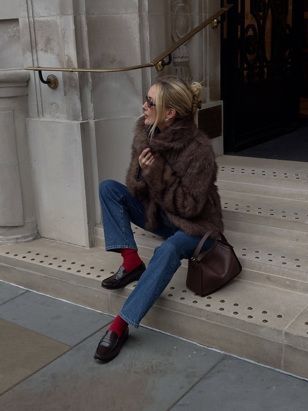 woman wearing medium wash cropped jeans trend