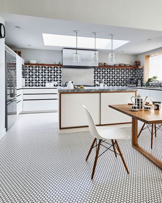 white modern kitchen with mosaic floors