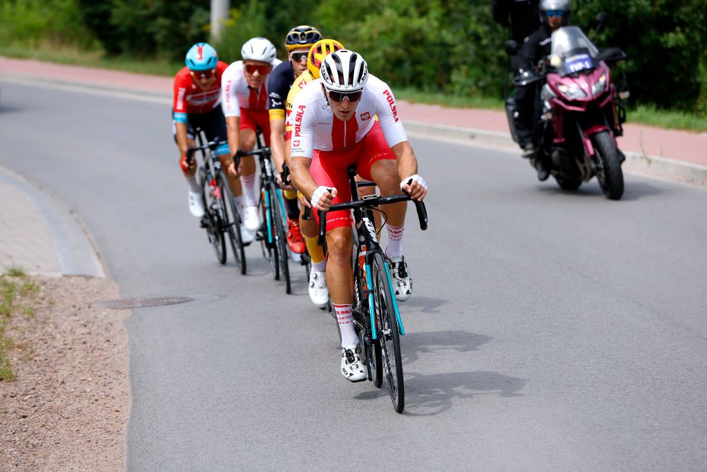 LUBLIN POLAND JULY 30 Mateusz Grabis of Poland and Team Poland competes in the breakaway during the 79th Tour de Pologne 2022 Stage 1 a 2188km stage from Kielce to Lublin TdP22 WorldTour on July 30 2022 in Lublin Poland Photo by Bas CzerwinskiGetty Images