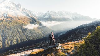 Man looking at Mont Blanc in the mist
