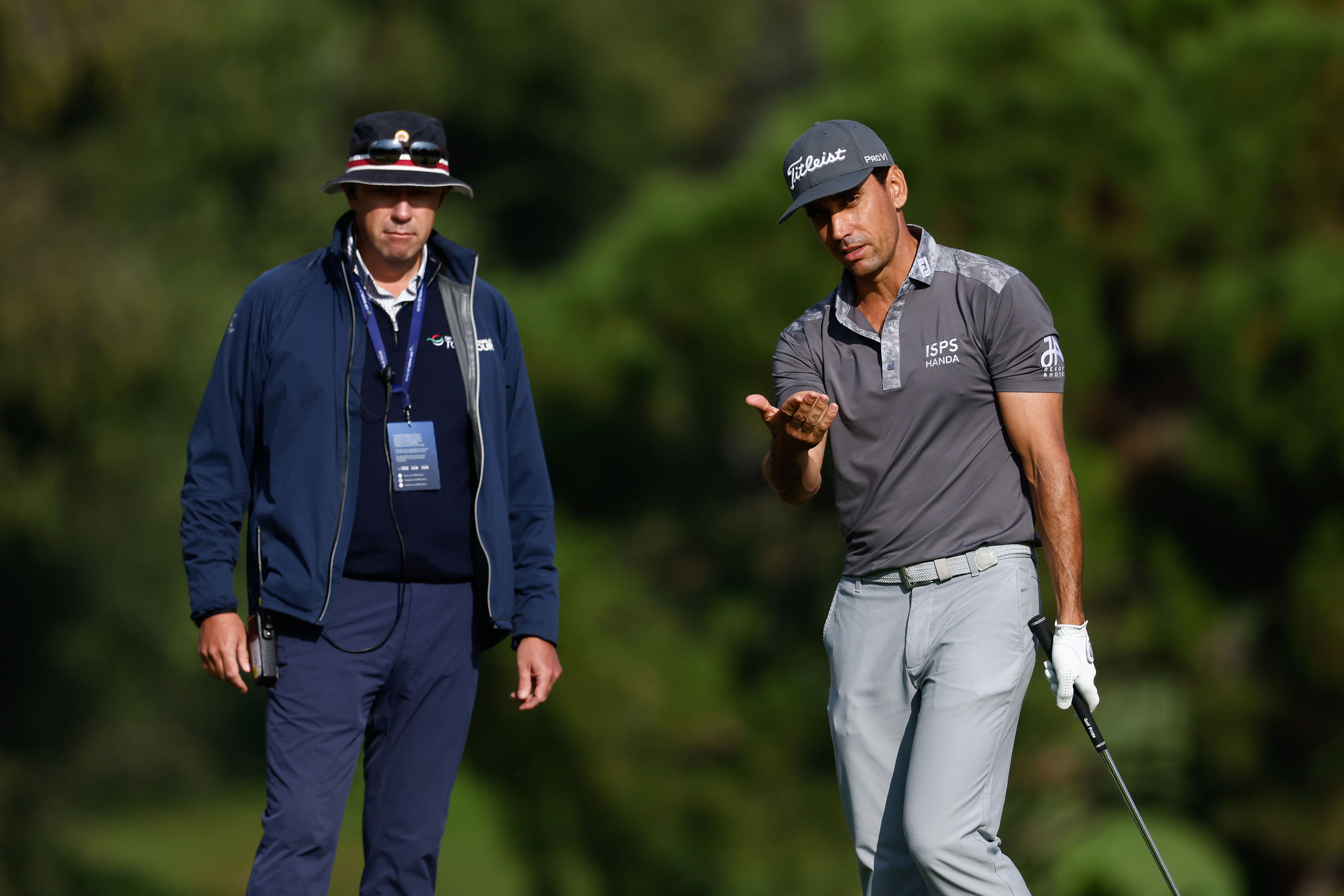 Player talks with a rules official