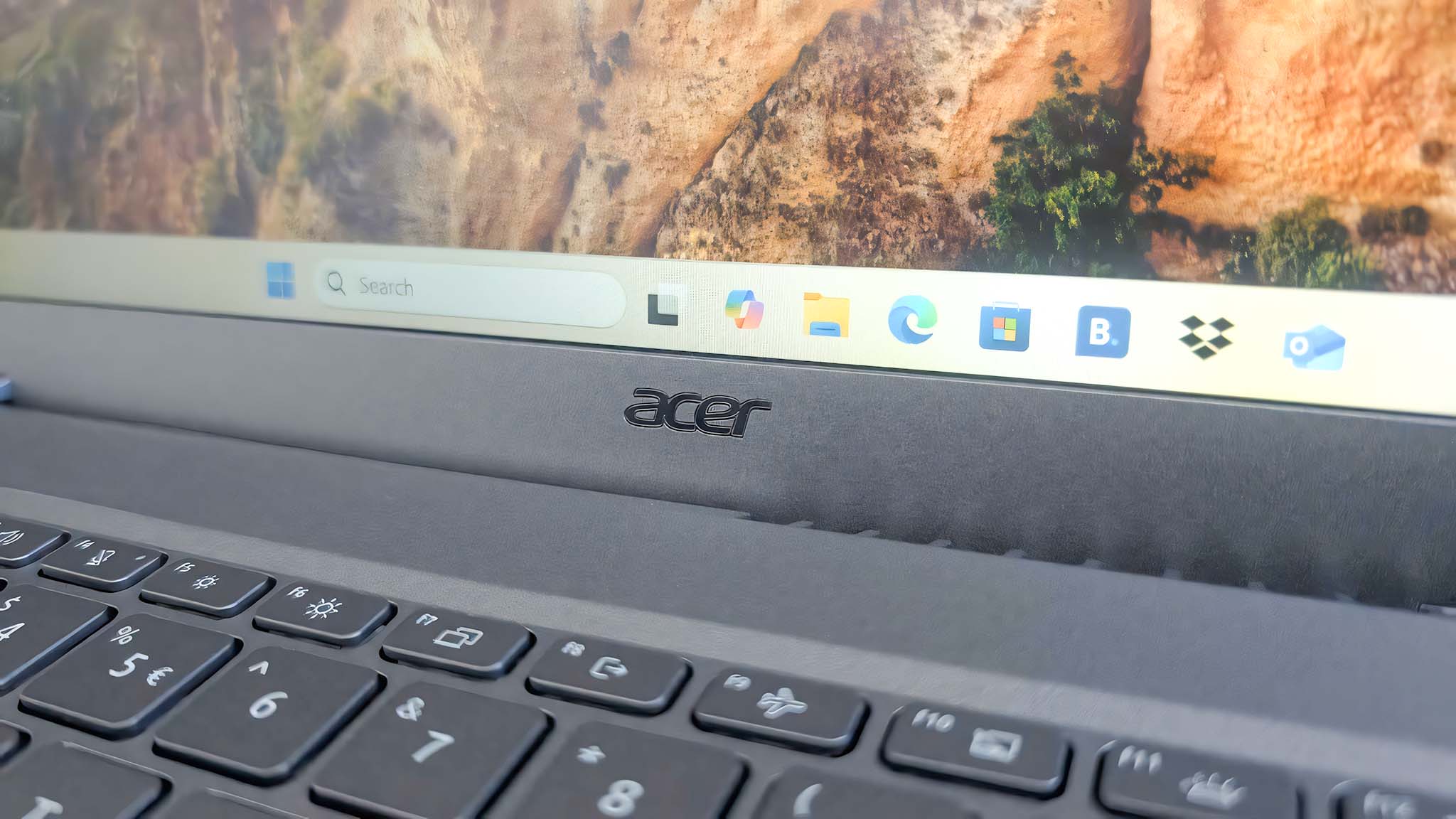 Close up of the Acer logo above the Aspire 14 AI's keyboard.