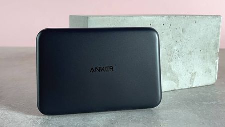 The top panel of the slim Anker power bank is facing forward.