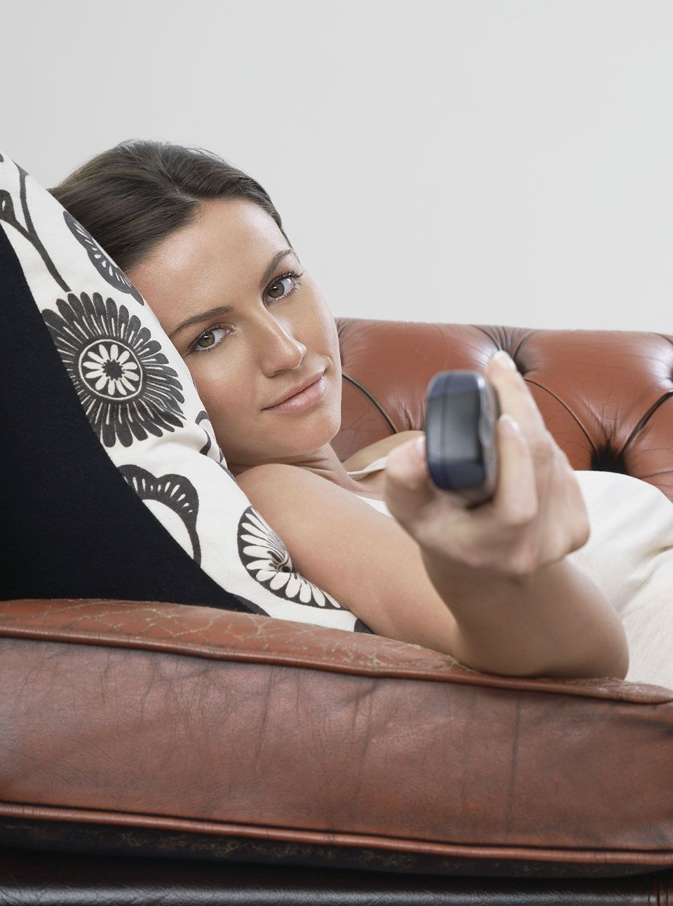 Woman lying on couch