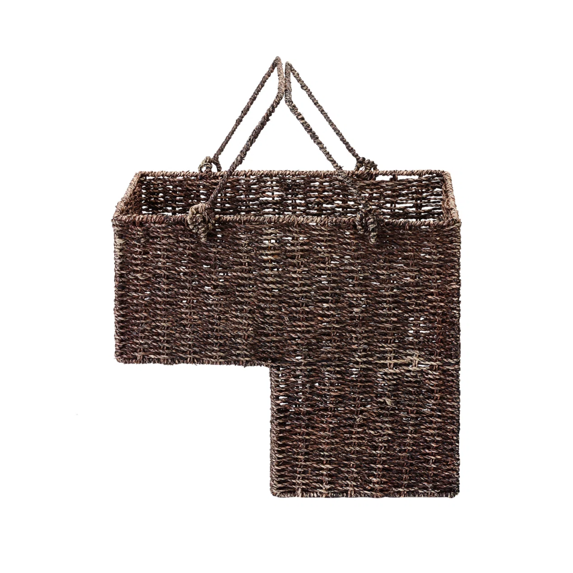 a woven staircase storage basket with handles